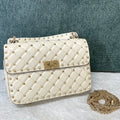 garavani rockstud spike medium 24cm white lambskin