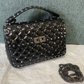 garavani rockstud spike medium 24cm black lambskin