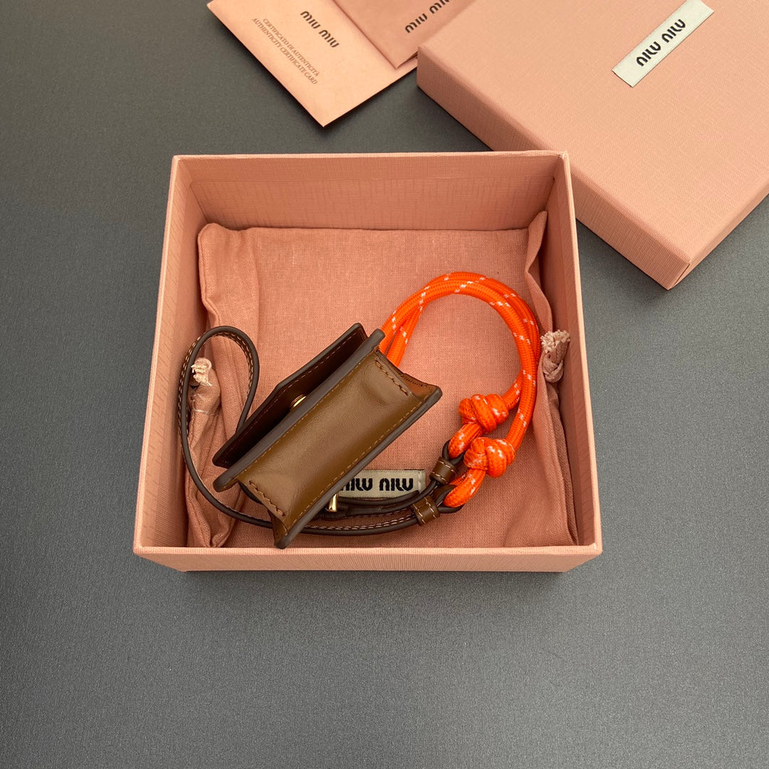MICRO BAG 7 IN TAWNY BROWN SMOOTH LAMBSKIN ORANGE STRAP