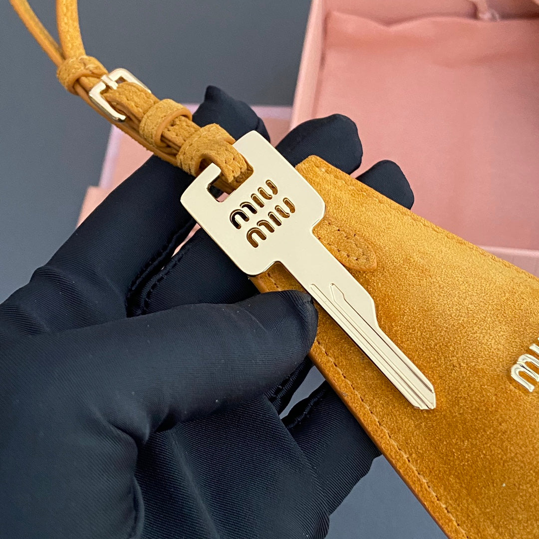 Leather Bag Charm With Key Yellow Orange Suede 240341