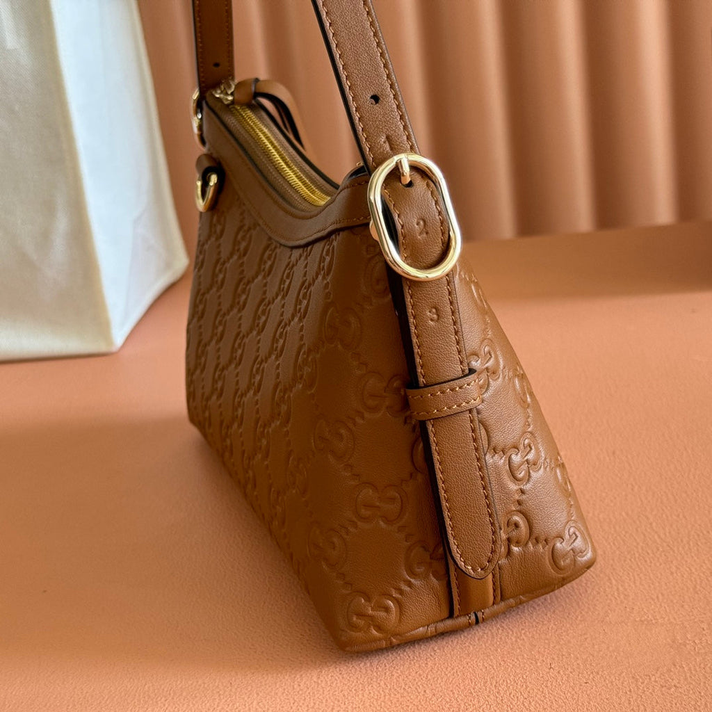 GG Emblem Shoulder Bag Brown Embossed Cowhide