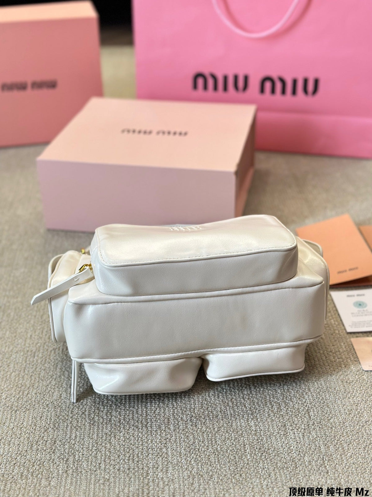 PUCKET BAG 27 IN WHITE CALFSKIN