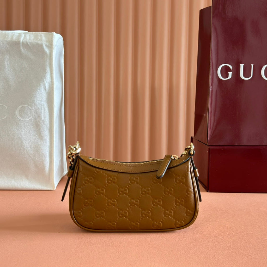 GG Emblem Mini Shoulder Bag Brown Embossed Cowhide