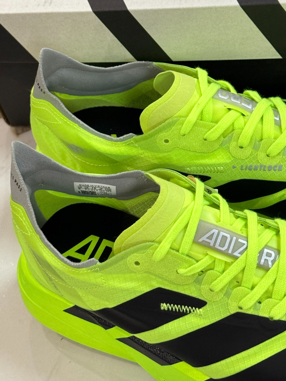 adidas Adizero Adios Pro 4 Running Shoes - Solar Yellow / Core Black