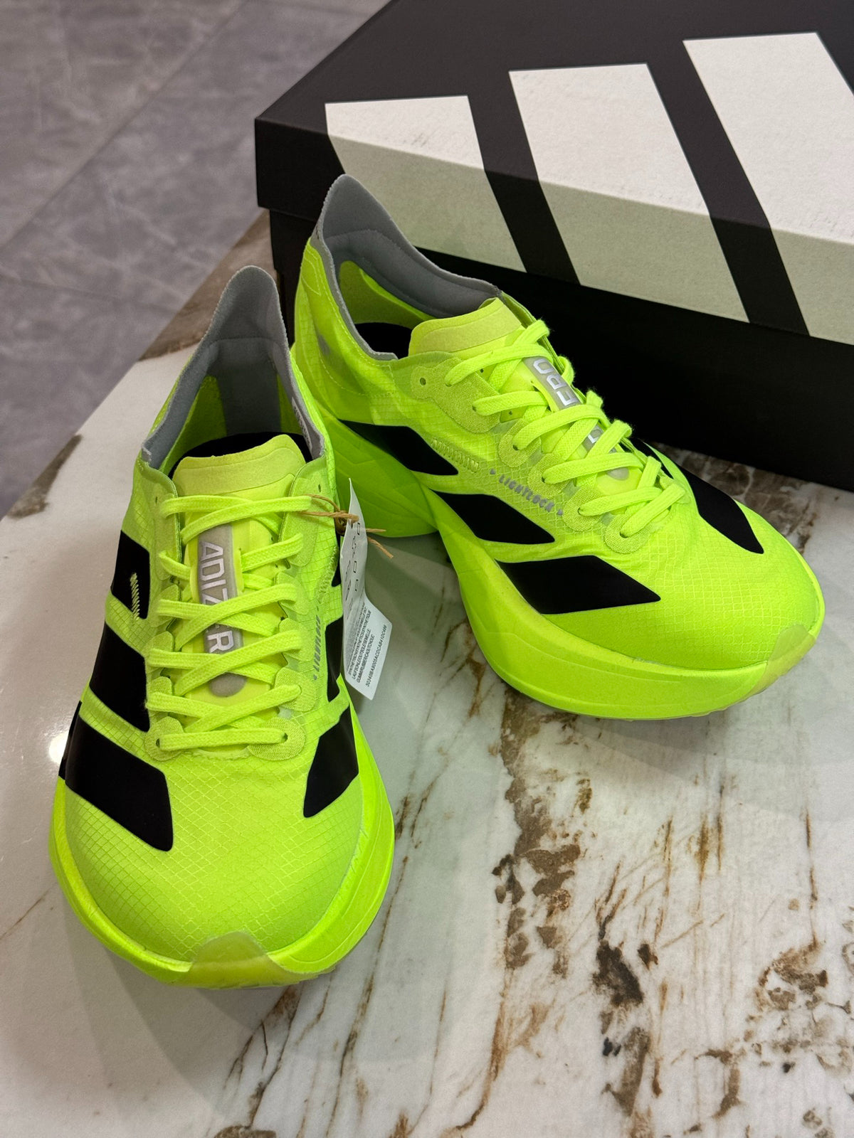 adidas Adizero Adios Pro 4 Running Shoes - Solar Yellow / Core Black