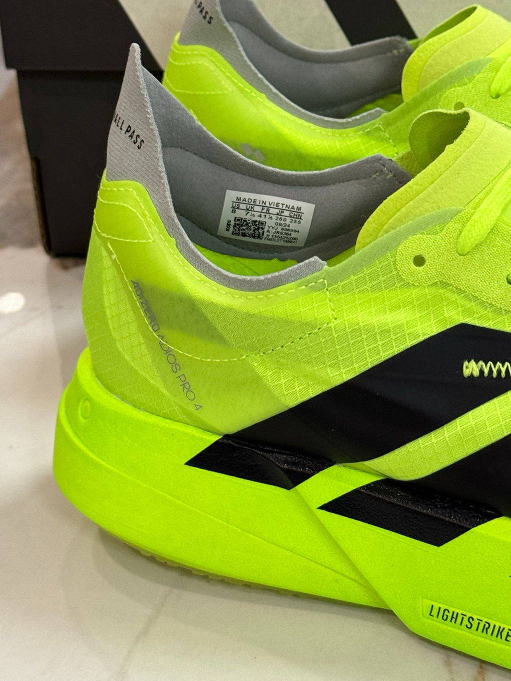 adidas Adizero Adios Pro 4 Running Shoes - Solar Yellow / Core Black