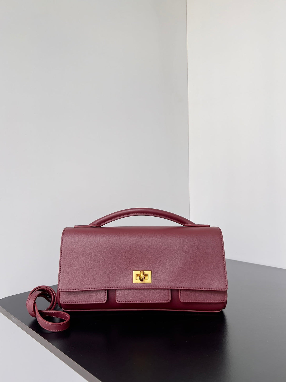 BEL AIR CLUTCH 27 IN BURGUNDY RED NAPPA LAMBSKIN GOLD HARDWARE